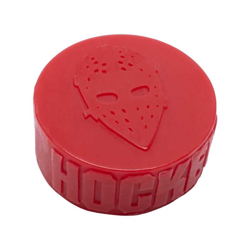 Hockey Skateboard Puck Wax - A large block of green wax shaped like a hockey puck.