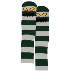 Close-up of Toy Machine socks featuring a large stripe design and a monster face.