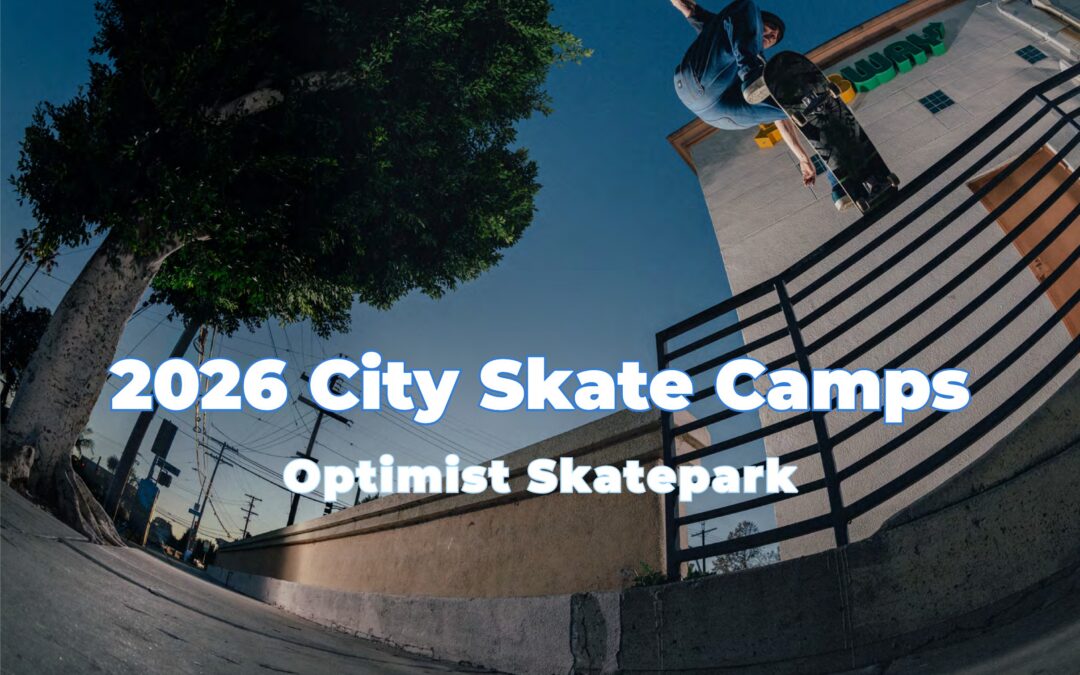 Skateboarder performing a backside noseslide on a handrail at a street spot, shot from a low angle
