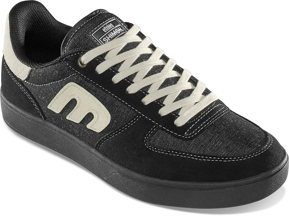Etnies Emerson x Shimon Black and Gum collaboration shoe featuring STI Evolution Foam and 400NBS rubber outsole.